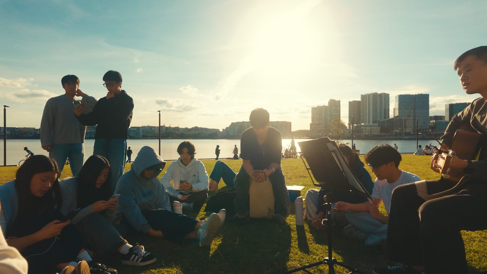 Leading worship together on the grass by the river